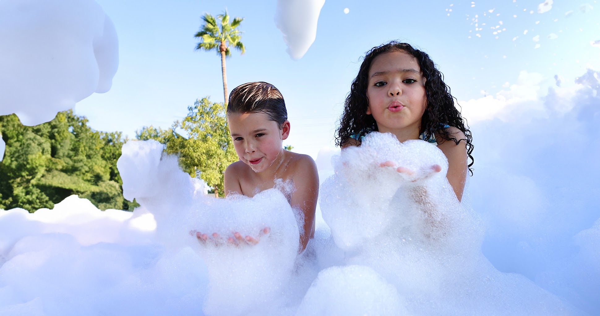 kids blowing bubbles